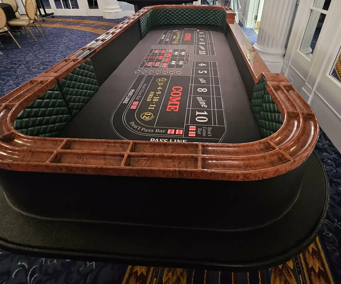 Full-size casino craps table ready for guests